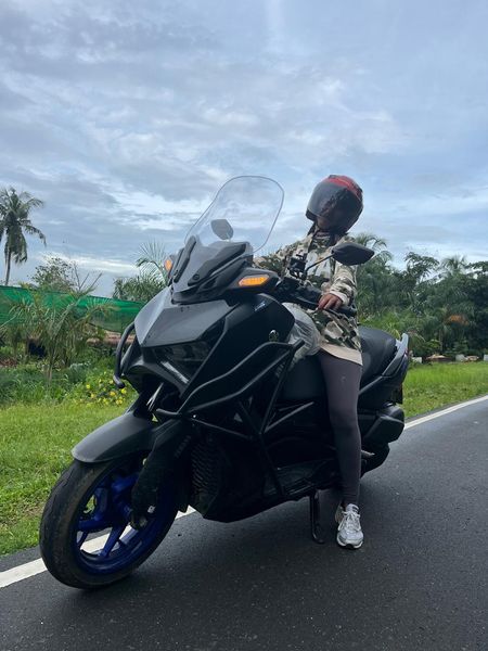 Rider on the Yamaha X-Max 300 on the road