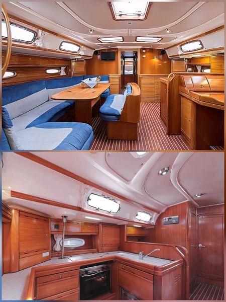 Saloon with dining table and the galley below deck