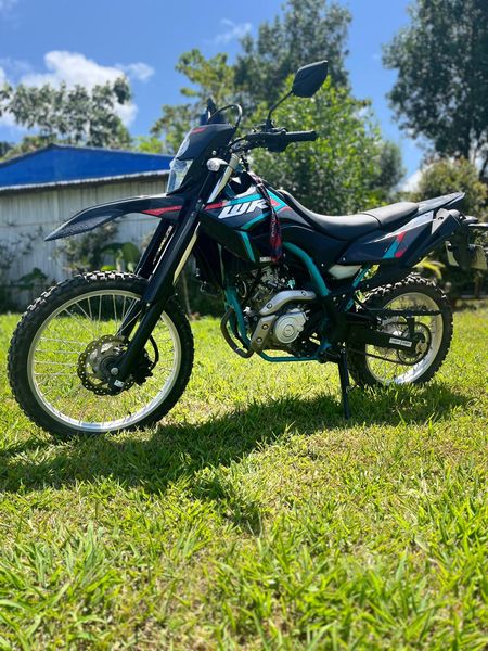 Yamaha WR 155 parked on grass